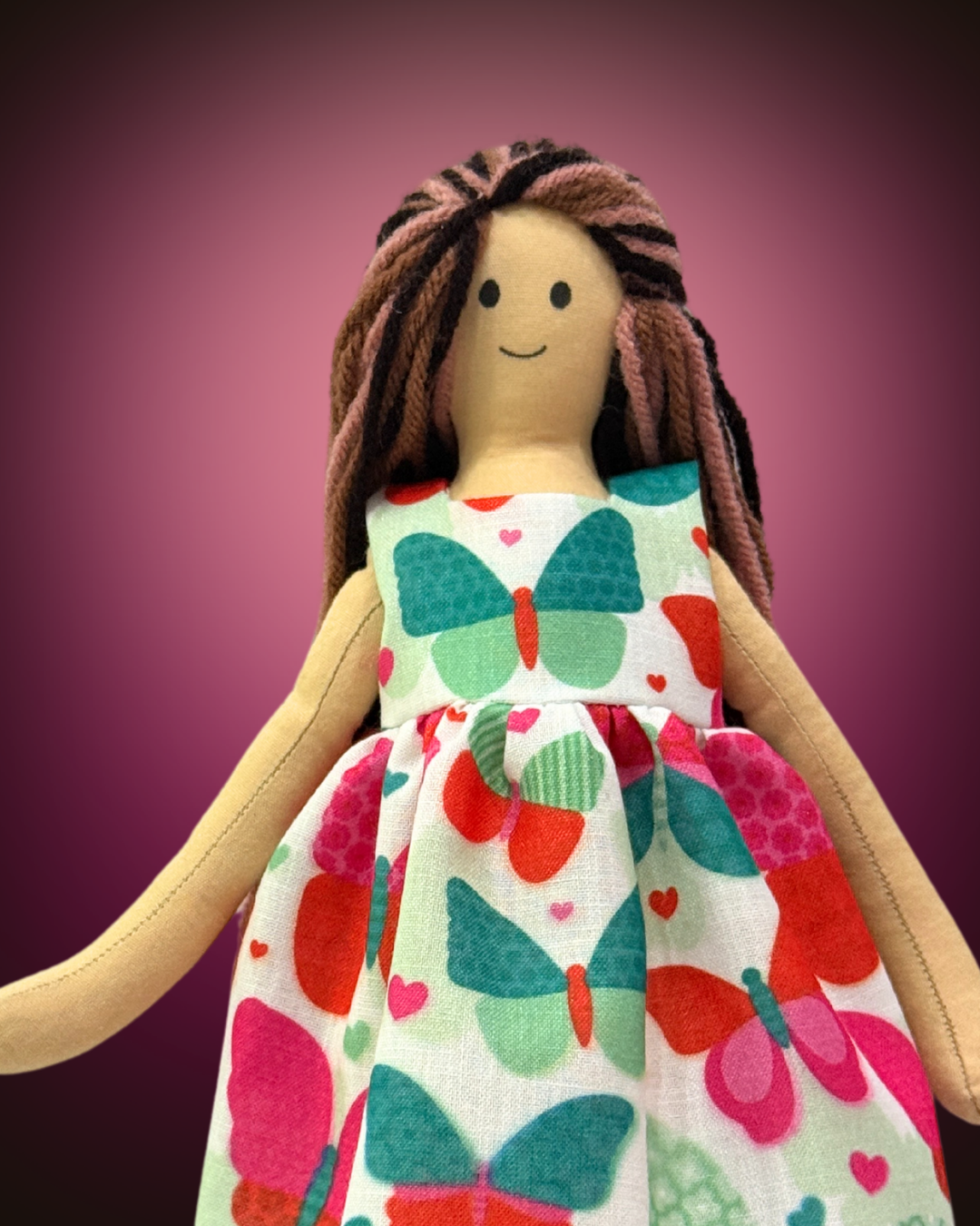 Green butterfly baby doll - eco-conscious organic cotton toy