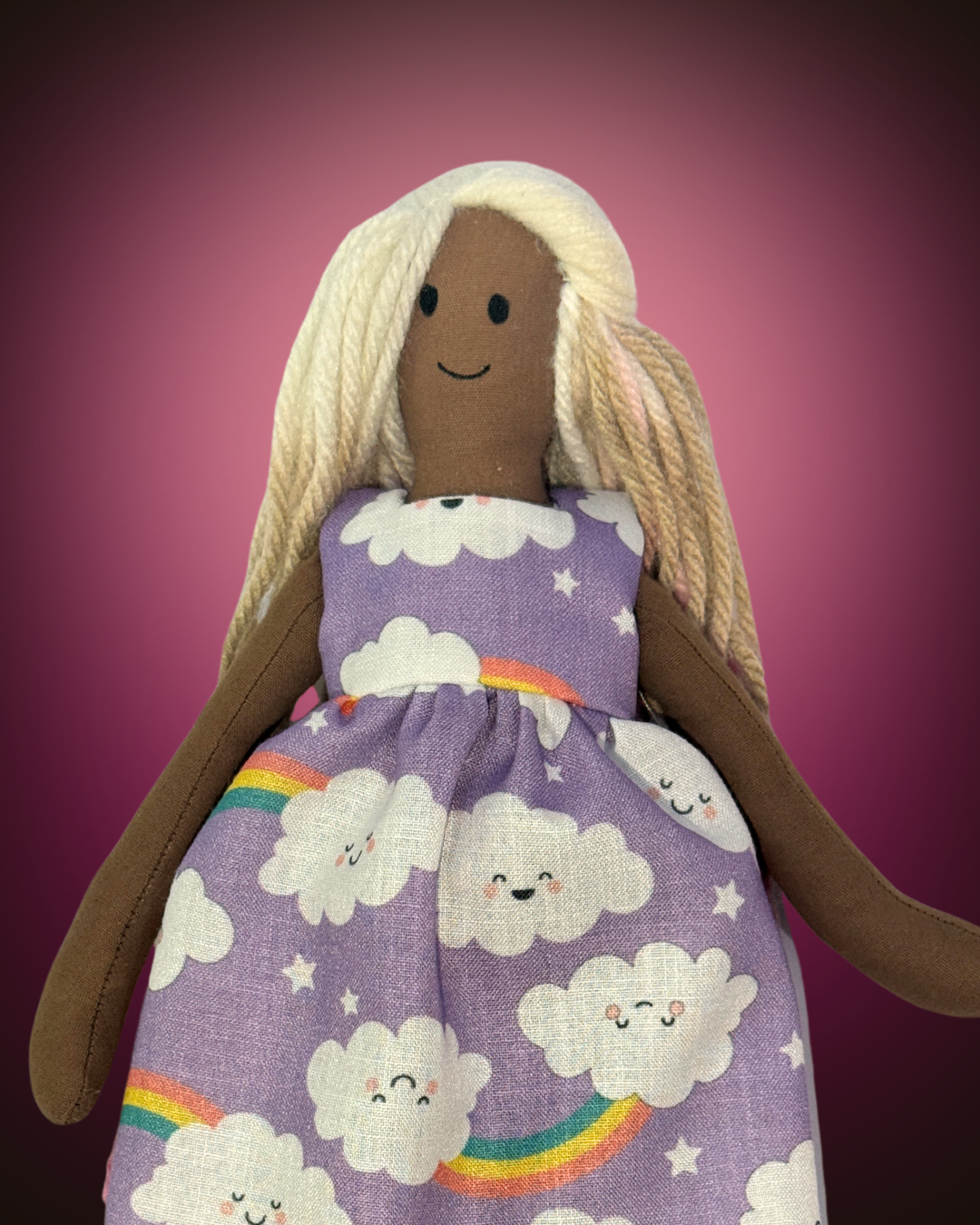 Sustainable handmade doll (UNINA ESPRESSO BLUSHIE) adorned with a dreamy purple clouds dress, tangle-free hair